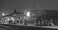 Passengers at Castleton Station on 10 August 1962 await holiday overnight special trains to many destinations. RS Greenwood